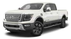 A white 2021 Nissan Titan XD is angled left.