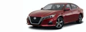A red 2021 Nissan Altima is angled left.