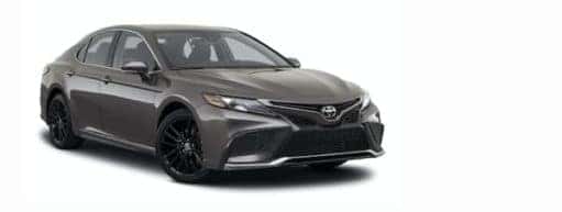 A silver 2021 Toyota Camry is angled right.