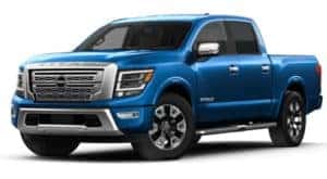 A blue 2023 Nissan Titan is shown angled left.