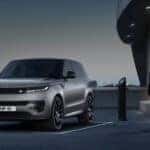 A silver 2025 Land Rover Range Rover Sport is shown from the front at an angle.