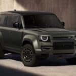 A grey 2025 Land Rover Defender 110 Octa Edition One is shown from the front at an angle.