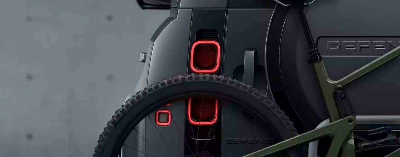 Rear details are shown on a grey 2023 Land Rover Defender for sale.