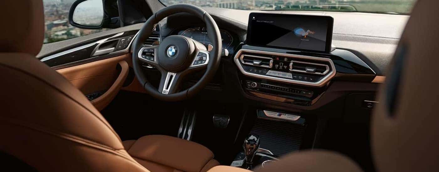 Black and brown interior in a 2024 BMW X3.