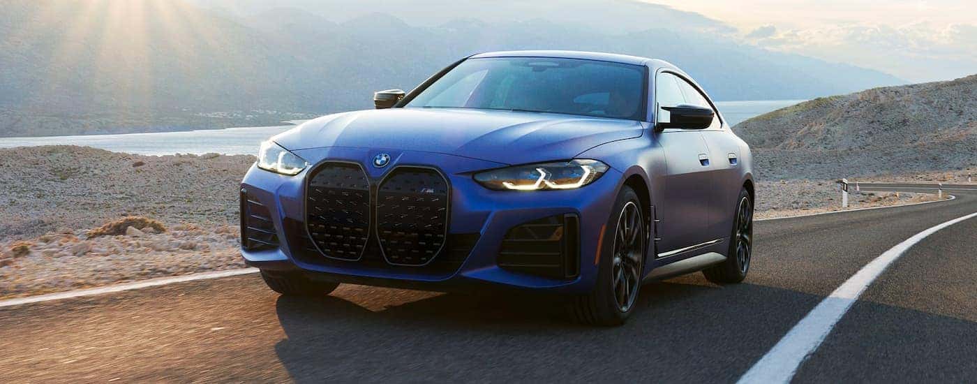 A blue 2023 BMW i4 M50 from a BMW dealer in Omaha