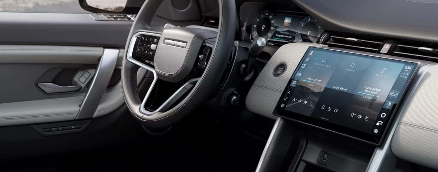 The interior of a 2025 Land Rover Discovery is shown.