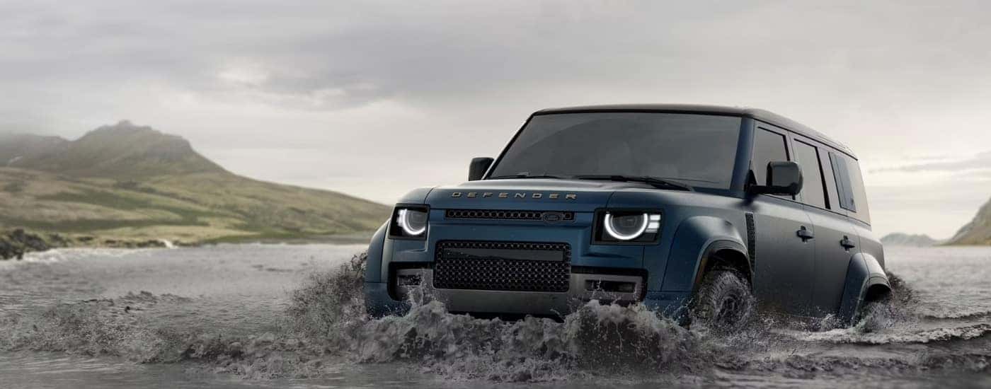 A blue 2025 Land Rover Defender OCTA from the front after leaving a Land Rover dealer near Lincoln.