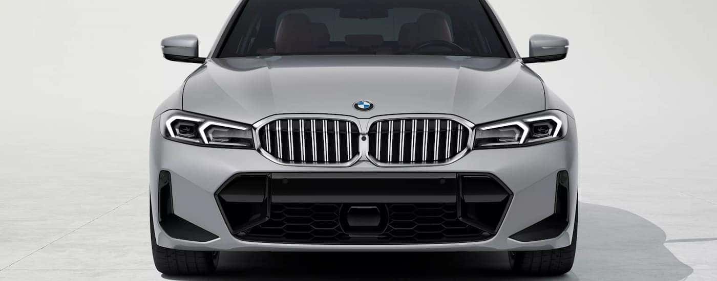 A silver 2026 BMW 3 Series parked