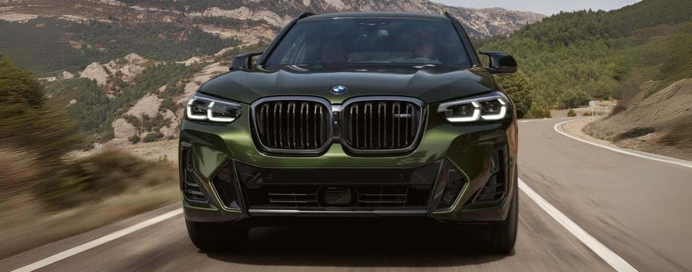 Green 2025 BMW X3 from the front one of the many for sale near Lincoln