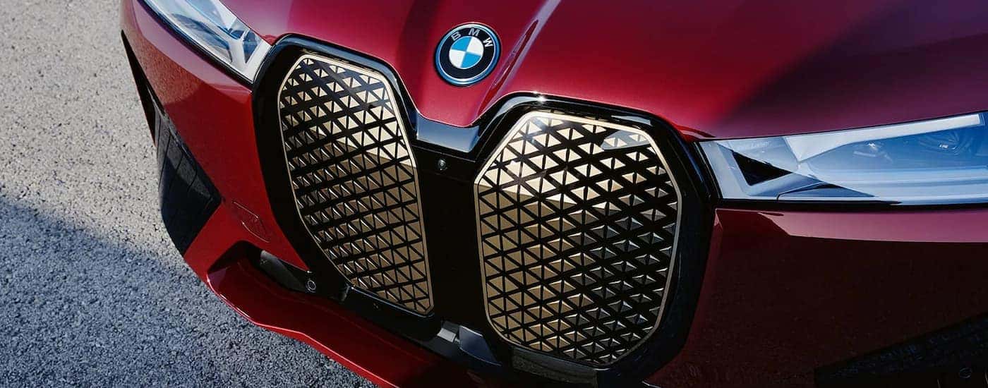 Front grille on a red 2022 BMW iX