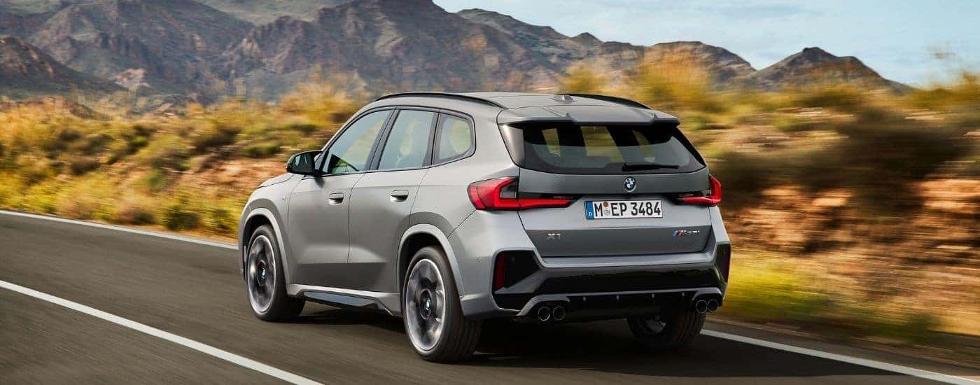 A grey 2025 BMW X1 for sale from the rear.