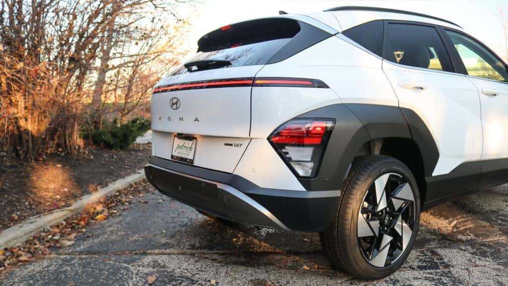 Hyundai KONA highlighting advanced safety technologies such as Hyundai SmartSense, including lane following assist, rear cross-traffic alert, and driver attention warning.