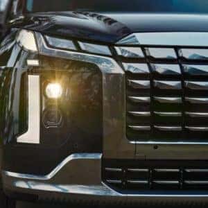 the passengers front grille and headlight on a 2025 hyundai palisade