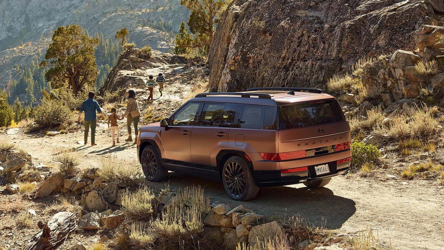 2025 Hyundai Santa Fe in Earthy Brass Matte, showcasing its rugged design.