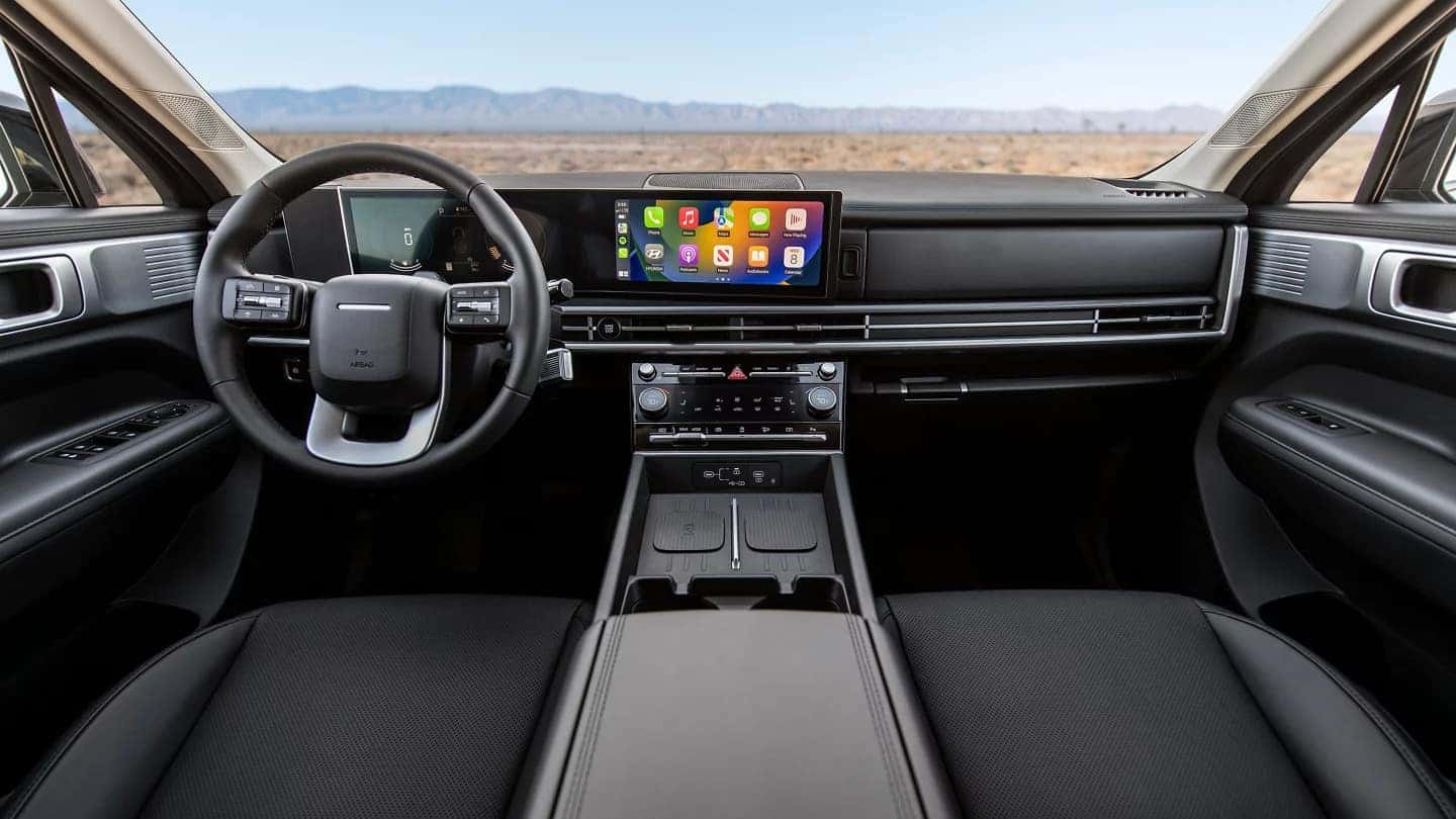 Interior of the 2025 Hyundai Santa Fe XRT featuring H-Tex seating surfaces and a rugged design.