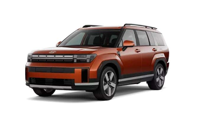2025 Hyundai Santa Fe Limited in Terracotta Orange with bold styling and distinctive front grille.