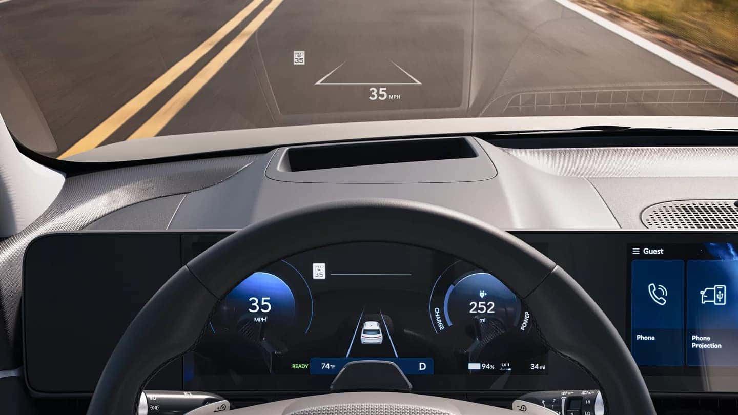 Head-up display in the 2025 Hyundai IONIQ 5 showing speed, lane markings, and navigation guidance.