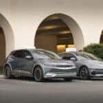 Hyundai IONIQ 5 and IONIQ 6 in front of tesla charging stations