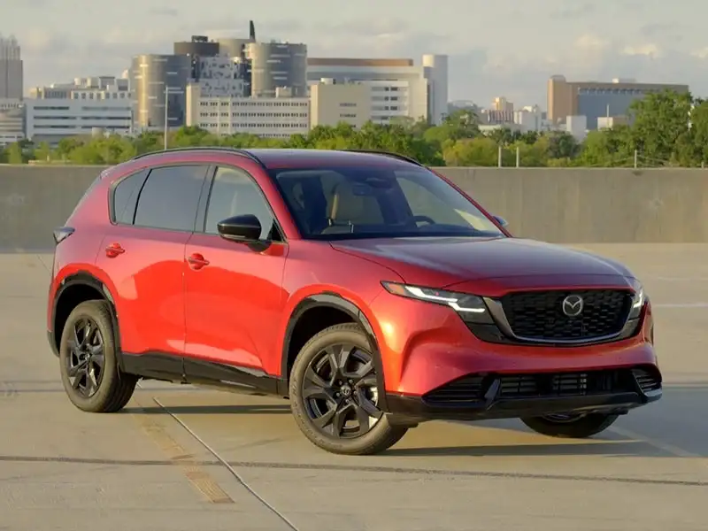 2026 Mazda CX-5 in Soul Red Crystal Metallic, front three-quarter view, at Sport Mazda North in Longwood, Florida