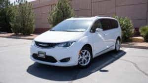 White Chrysler Pacifica in parking lot