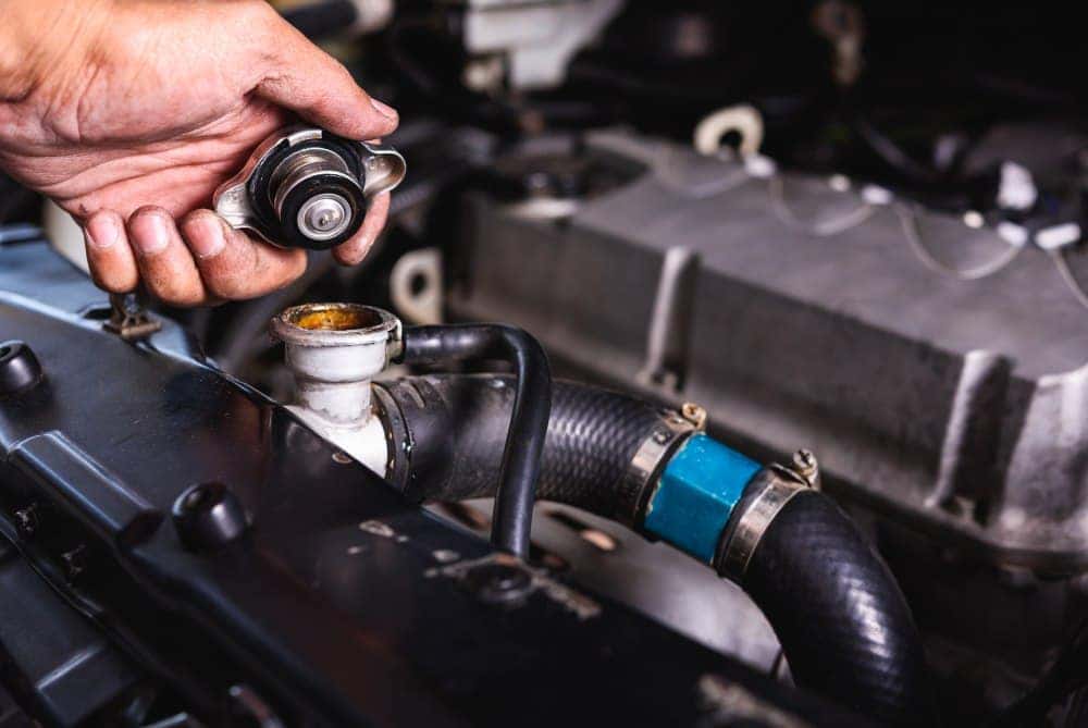 man undergoes radiator repair service