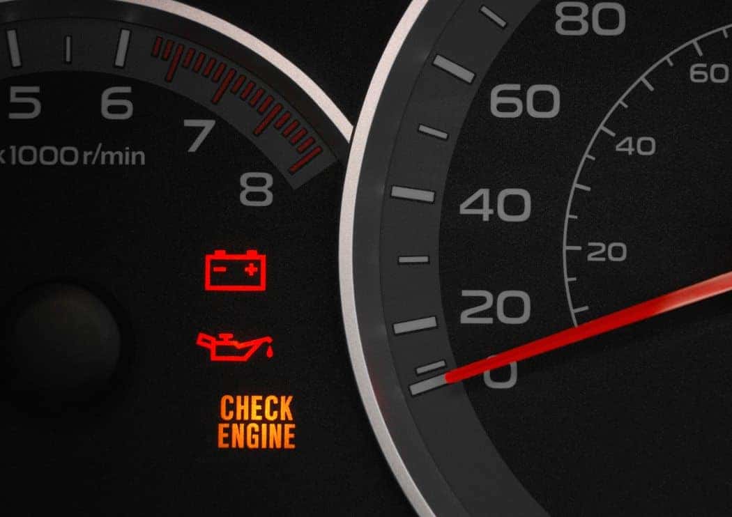speedometer highlighting engine light