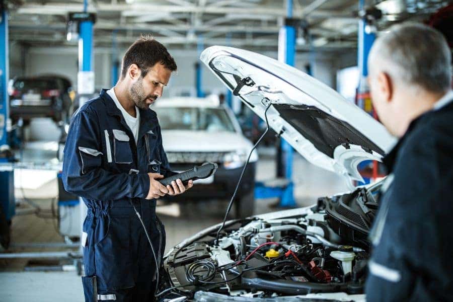 A technician undergoes vehicle inspection service at the showroom in St. George, UT