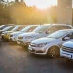 Selection of SUVs, sedans, and crossovers parked in a dealership lot for cargo space comparison