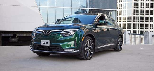 A green VinFast VF 8 